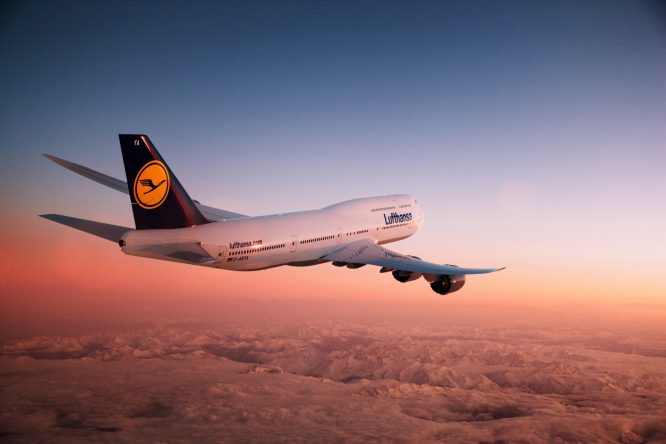 boeing-lufthansa-sunset-plane-flies-in-the-air-sky-boeing-mountain-land-flight-airliner