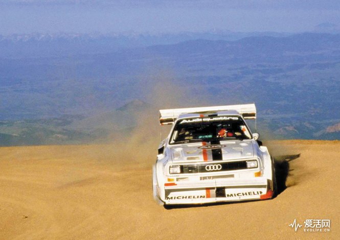 1987: world record at Pikes Peak with the Audi Sport quattro S1 (E2): In 1987, Walter Rohrl wins the legendary Pikes Peak Hill Climb (USA) in the Audi Sport quattro S1 (E2), setting a new record. In 10 minutes and 47.85 seconds he conquers the almost 20-kilometer-long (12.43 mi) course with 156 bends and a difference in altitude of 1,439 meters (4721.13 ft). The 2.1-liter five-cylinder engine in the Audi Sport quattro S1 (E2) delivers 440 kW (598 hp) at 8,000 revolutions per minute and produces 590 newton meters (435.16 lb-ft) of torque at 5,500 rpm.