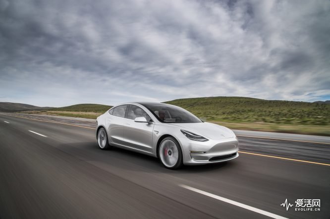 2017-Tesla-Model-3-front-three-quarter-in-motion-02