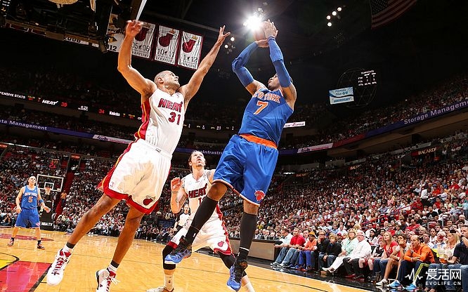 MIAMI, FL - APRIL 2: Carmelo Anthony #7 of the New York Knicks takes an awkward shot against Shane Battier #31 of the Miami Heat during a game on April 2, 2013 at American Airlines Arena in Miami, Florida. NOTE TO USER: User expressly acknowledges and agrees that, by downloading and/or using this photograph, user is consenting to the terms and conditions of the Getty Images License Agreement. Mandatory copyright notice: Copyright NBAE 2013 (Photo by Nathaniel S. Butler/NBAE via Getty Images)