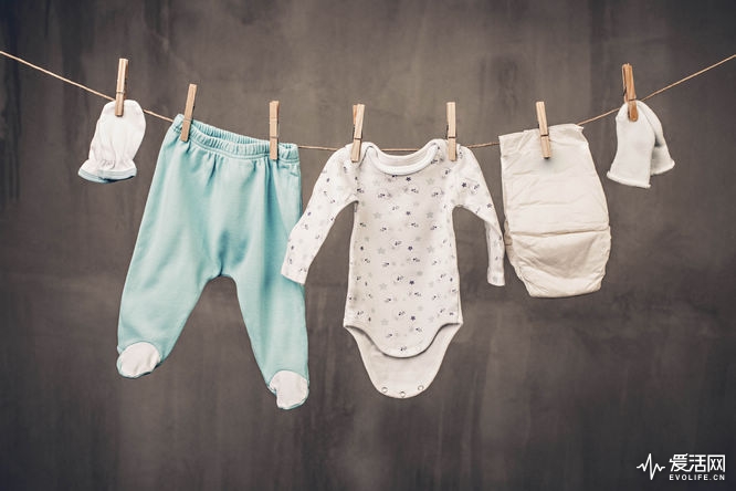 Baby clothes hanging on the clothesline.