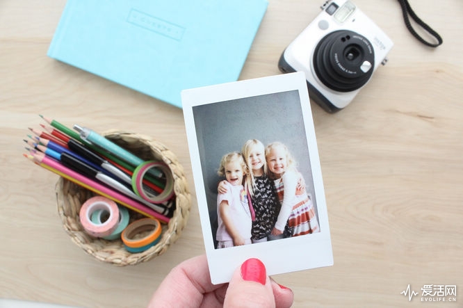 share-an-instant-photo-with-friends-using-an-Instax-camera