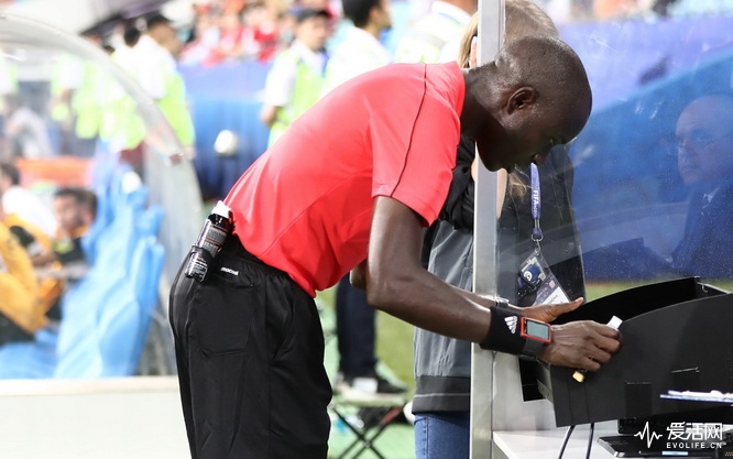 SOCHI, RUSSIA - JUNE 21: Referee Bakary Gassama reviwes footage of a mass brawl during the FIFA Confederations Cup Russia 2017 Group A match between Mexico and New Zealand at Fisht Olympic Stadium on June 21, 2017 in Sochi, Russia. (Photo by Alex Grimm - FIFA/FIFA via Getty Images)