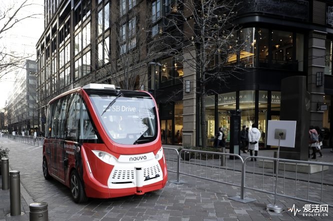 A Navya Arma autonomous shuttle bus, manufactured by Navya Technologies SAS, travels during a test drive in Tokyo, Japan, on Friday, Dec. 22, 2017. The bus owned and operated by SB Drive Corp., a unit of SoftBank Group Corp., was conducting its first test on a public road. Photographer: Kiyoshi Ota/Bloomberg