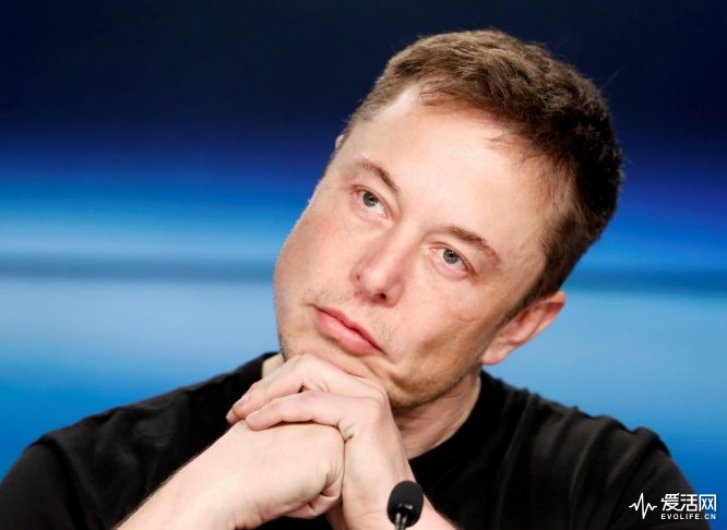FILE PHOTO: Elon Musk listens at a press conference following the first launch of a SpaceX Falcon Heavy rocket at the Kennedy Space Center in Cape Canaveral, Florida, U.S., February 6, 2018. REUTERS/Joe Skipper/File Photo