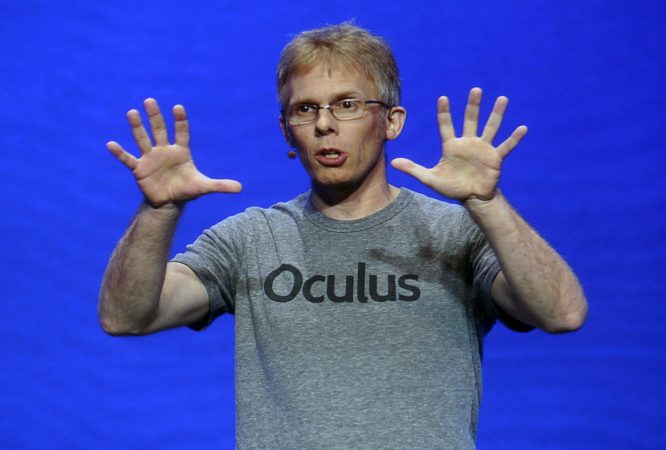 John Carmack, Chief Technical Officer of Oculus, speaks during the Oculus 2 conference in Los Angeles, Thursday, Sept. 24, 2015. Samsung says the new virtual reality headset will be 22 percent lighter and, at $99, half the price of its previous model. The Korean electronics company hopes the changes to the Gear VR, which ships in November, will help push virtual reality into the mainstream. (AP Photo/Nick Ut)